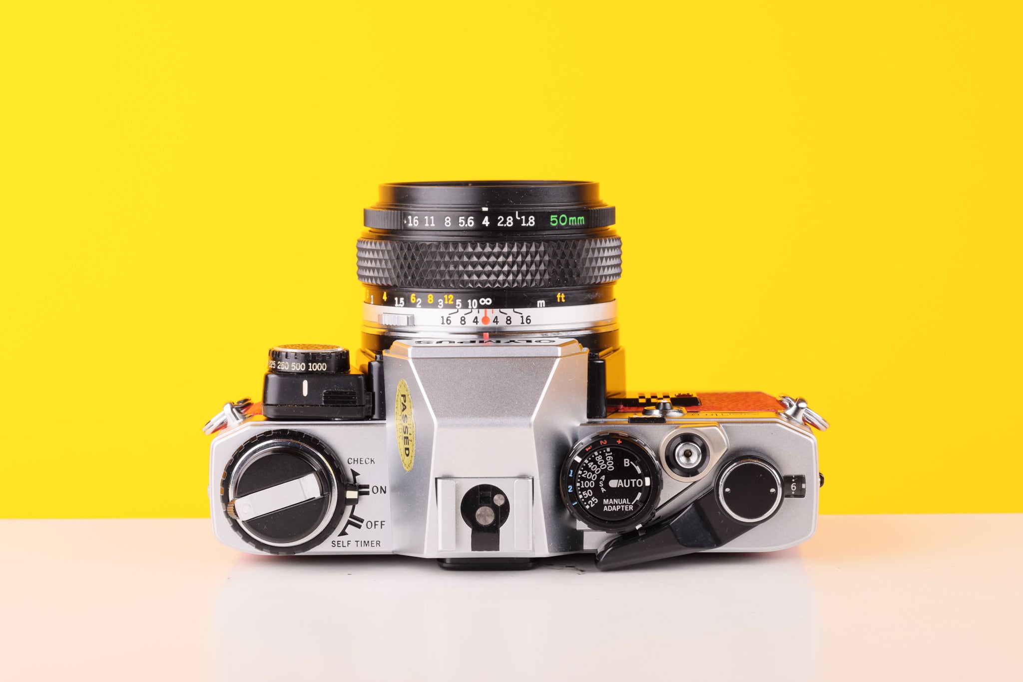 Olympus OM10 35mm Film Camera with Zuiko 50mm f1.8 Prime Lens Red