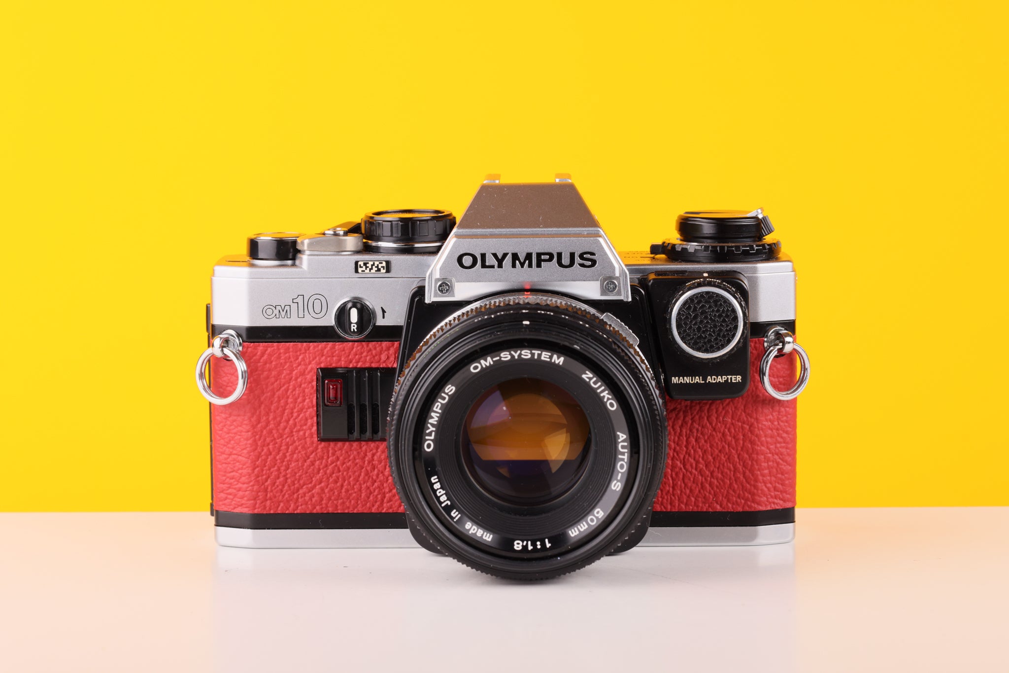 Olympus OM10 35mm Film Camera with Zuiko 50mm f1.8 Prime Lens Red