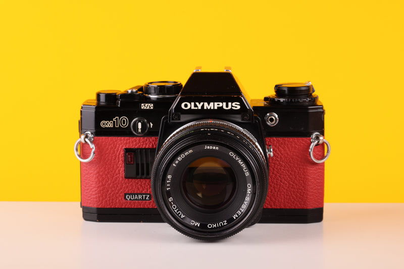 Olympus OM10 Black Quarz 35mm SLR Film Camera with Zuiko 50mm f/1.8