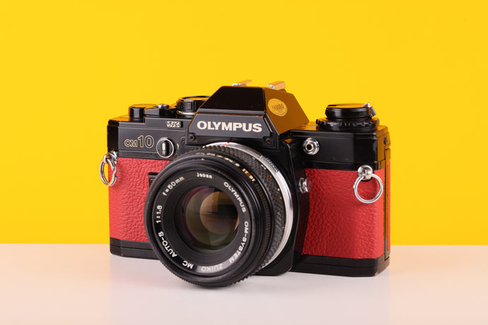 Olympus OM10 Black Quarz 35mm SLR Film Camera with Zuiko 50mm f/1.8 Lens