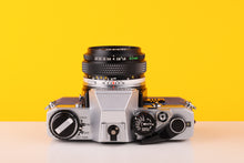 Load image into Gallery viewer, Olympus OM10 SLR Vintage 35mm Film Camera 
