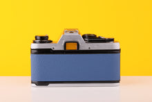Load image into Gallery viewer, Olympus OM10 SLR Vintage 35mm Film Camera with Zuiko 50mm f/1.8 Prime Lens 
