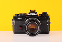 Load image into Gallery viewer, Olympus OM4 35mm Film Camera with Zuiko 50mm f1.8 Prime Lens
