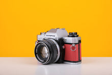 Load image into Gallery viewer, Olympus OM10 35mm Film Camera with Zuiko 50mm f1.8 Prime Lens Red Leather Skin
