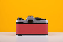 Load image into Gallery viewer, Olympus OM10 35mm Film Camera with Zuiko 50mm f1.8 Prime Lens Red Leather Skin

