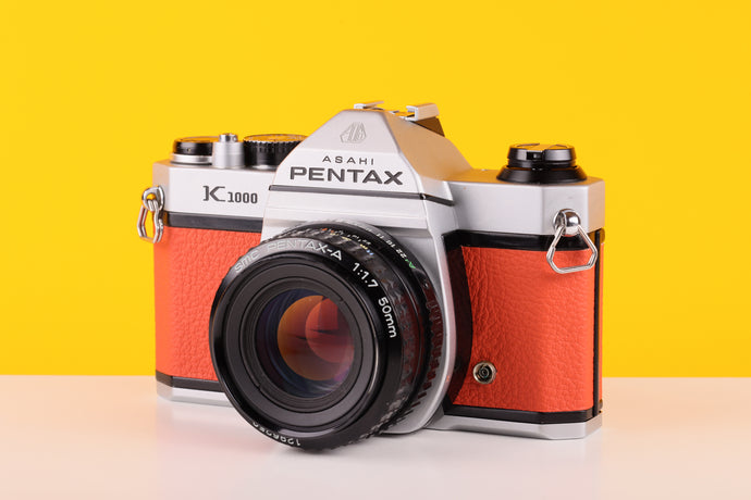 Pentax K1000 35mm Film Camera with SMC-M 50mm f/1.7 Prime Lens in Orange