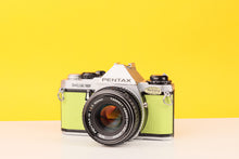 Load image into Gallery viewer, Pentax ME Super 35mm Film Camera with SMC Pentax-M 50mm f/1.7 Lens in Lime Green
