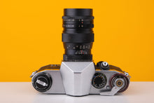Load image into Gallery viewer, Praktica Super TL 35mm Film Camera with Edixar 135mm f/3.5 Lens
