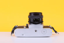 Load image into Gallery viewer, Chinon CS 35mm SLR Film Camera with 55mm f/1.7 Lens
