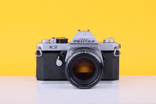 Load image into Gallery viewer, Pentax K2 35mm Film Camera with SMC Pentax-A 50mm f/1.4 Lens
