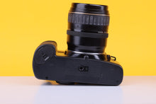 Load image into Gallery viewer, Canon EOS 100 35mm SLR Film Camera with 28-80mm Lens
