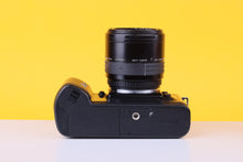 Load image into Gallery viewer, Nikon F-401 35mm SLR Film Camera with Sigma 28-70mm f3.5 Lens
