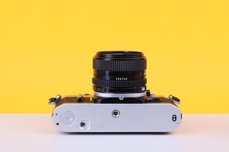 Canon AE-1 35mm SLR Film Camera with Canon 28mm f/2.8 Lens