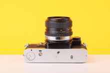 Load image into Gallery viewer, Olympus OM10 35mm Film Camera with  28mm f2.8 MC Lens with Manual Adapter

