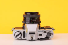 Load image into Gallery viewer, Minolta X-300 35mm Film Camera with Vivitar Mc 28mm f2.8 Lens
