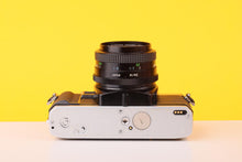 Load image into Gallery viewer, Minolta X-300 35mm Film Camera with Vivitar Mc 28mm f2.8 Lens
