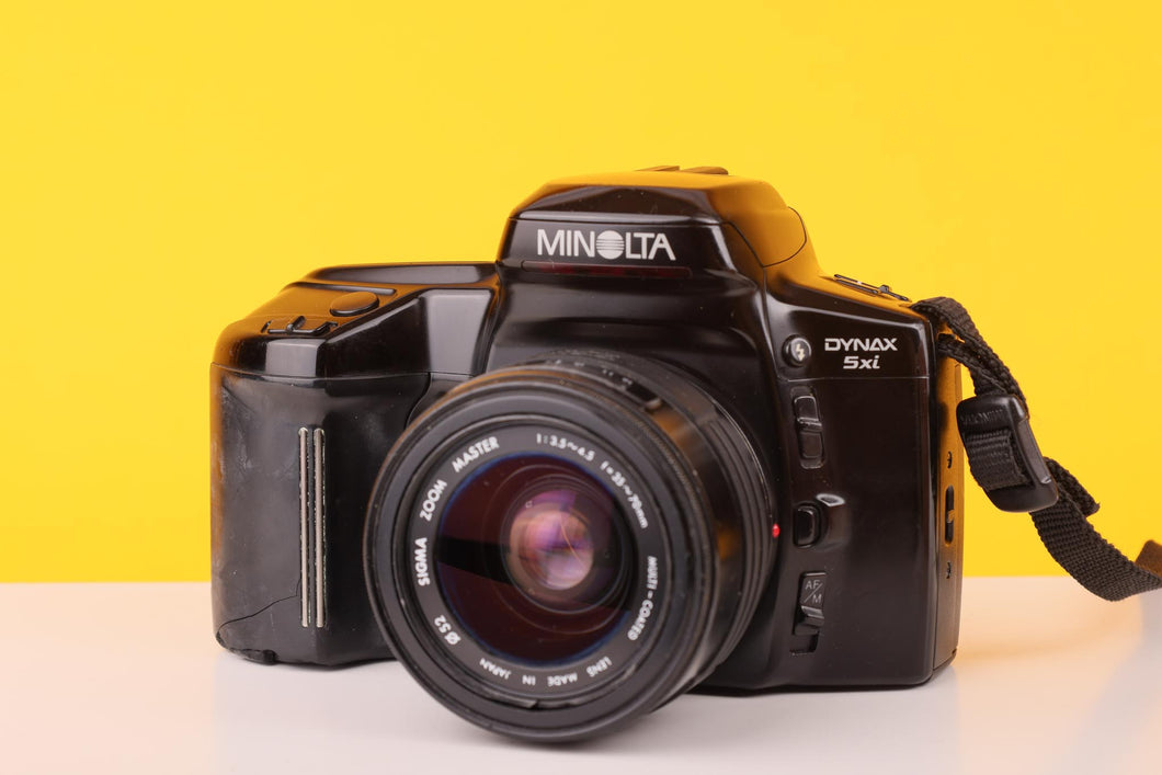 Minolta Dynax 5xi 35mm SLR Film Camera with Sigma AF 35-70mm f4- 5.6 Zoom Lens