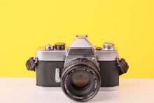 Load image into Gallery viewer, Minolta SR-1 35mm Film Camera with Minolta MC Rokkor 50mmmm f1.7 Lens

