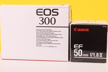 Load image into Gallery viewer, Canon EOS 300/ Kiss III 35mm SLR Film Camera with Canon 50mm f/1.8 Lens
