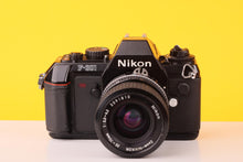 Load image into Gallery viewer, Nikon F-301 35mm SLR Film Camera with Nikkor 35-70mm f3.3-4.5 Lens
