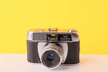 Load image into Gallery viewer, Halina Paulette Electric 35mm Viewfinder Film Camera with Halinar 45mm f2.8 F.C. Lens
