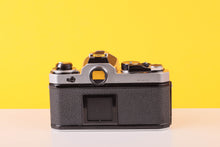 Load image into Gallery viewer, Nikon FE Silver 35mm Film Camera with Nikon 50mm f/1.8 Lens
