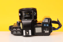 Load image into Gallery viewer, Minolta 7000 35mm SLR Film Camera with Minolta 50mm f1.7 Lens

