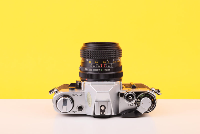 Canon AE-1 35mm Film Camera with Tokina 28mm f2.8 Zoom Lens