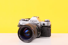 Load image into Gallery viewer, Canon AE-1 35mm Film Camera with Tokina 28-85mm f3.5 Zoom Lens
