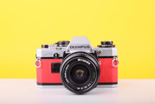 Load image into Gallery viewer, Olympus OM10 35mm SLR Film Camera with Miranda 28mm f/2.8 Lens in Scarlet Red
