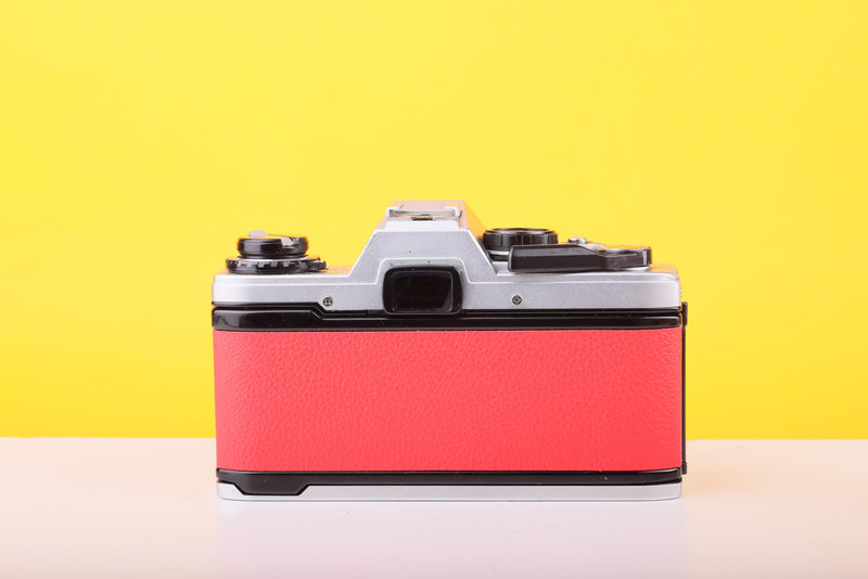 Olympus OM10 35mm SLR Film Camera with Miranda 28mm f/2.8 Lens in Scarlet Red