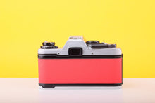 Load image into Gallery viewer, Olympus OM10 35mm SLR Film Camera with Miranda 28mm f/2.8 Lens in Scarlet Red
