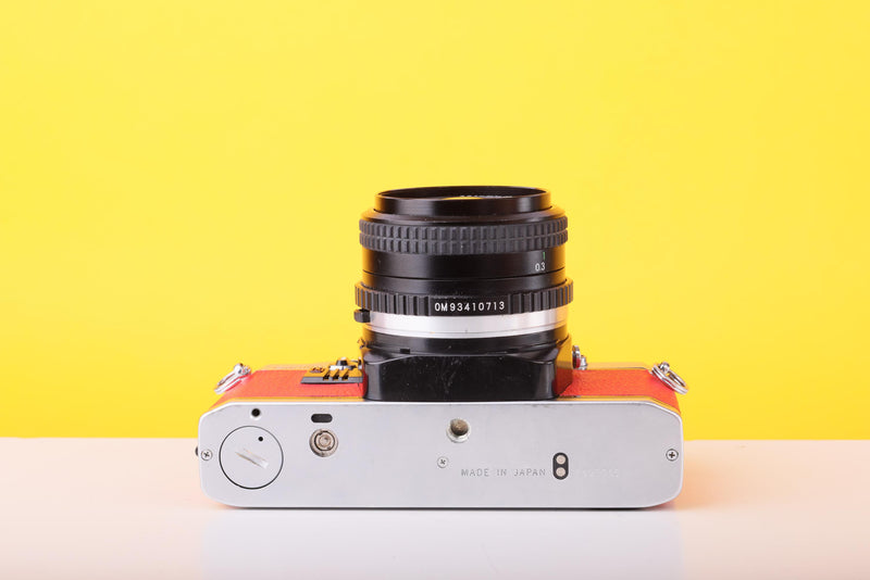 Olympus OM10 35mm SLR Film Camera with Miranda 28mm f/2.8 Lens in Scarlet Red