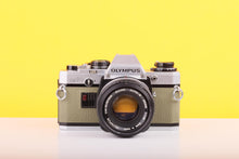 Load image into Gallery viewer, Olympus OM10 35mm Film Camera with Zuiko 50mm f1.8 Prime Lens Olive

