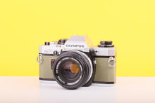 Load image into Gallery viewer, Olympus OM10 35mm Film Camera with Zuiko 50mm f1.8 Prime Lens Olive
