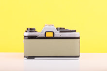 Load image into Gallery viewer, Olympus OM10 35mm Film Camera with Zuiko 50mm f1.8 Prime Lens Olive
