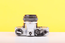 Load image into Gallery viewer, Olympus OM10 35mm Film Camera with Zuiko 50mm f1.8 Prime Lens Olive
