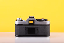 Load image into Gallery viewer, Canon AE-1 Program 35mm SLR Film Camera with Canon FD 50mm f/1.8 Lens – Boxed
