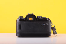 Load image into Gallery viewer, Nikon F-301 35mm SLR Film Camera with Bell &amp; Howell 24mm f/2.8 Lens
