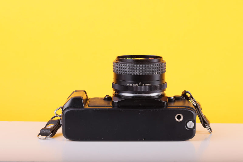 Nikon F-301 35mm SLR Film Camera with Bell & Howell 24mm f/2.8 Lens