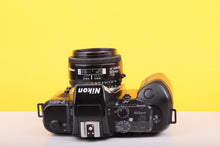 Load image into Gallery viewer, Nikon F-401s 35mm SLR Film Camera with AF Nikkor 50mm f/1.8 Lens
