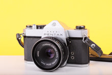 Load image into Gallery viewer, Asahi Pentax SP1000 35mm SLR Film Camera with Carl Zeiss Jena DDR Tessar 50mm f/2.8 Lens

