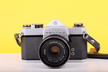 Load image into Gallery viewer, Asahi Pentax SP1000 35mm SLR Film Camera with Carl Zeiss Jena DDR Tessar 50mm f/2.8 Lens
