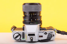 Load image into Gallery viewer, Minolta X-300 35mm SLR Film Camera with Minolta MD Zoom 28–70mm f/3.5–4.8 Lens
