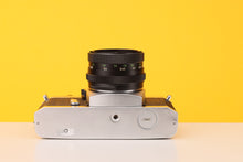 Load image into Gallery viewer, Chinon CX 35mm SLR Film Camera with Pentacon 50mm f/1.8
