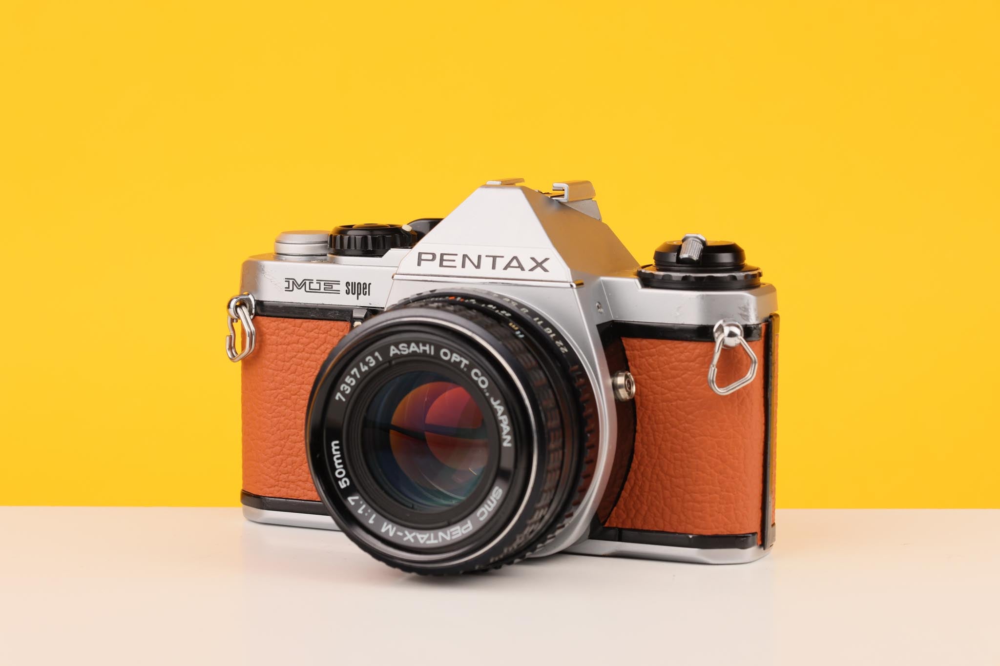 Pentax ME Super Vintage 35mm Film Camera with SMC Pentax-M 50mm f/1.7 Lens Burnt Orange