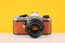 Load image into Gallery viewer, Pentax ME Super Vintage 35mm Film Camera with SMC Pentax-M 50mm f/1.7 Lens Burnt Orange

