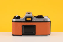 Load image into Gallery viewer, Pentax ME Super Vintage 35mm Film Camera with SMC Pentax-M 50mm f/1.7 Lens Burnt Orange
