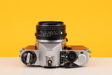 Load image into Gallery viewer, Pentax ME Super Vintage 35mm Film Camera with SMC Pentax-M 50mm f/1.7 Lens Burnt Orange
