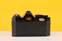 Load image into Gallery viewer, Miranda MS-1 Super 35mm SLR Film Camera with Sigma 28mm f/2.8 Lens
